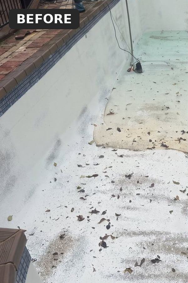 Before: pool with stained, flaking white surface
