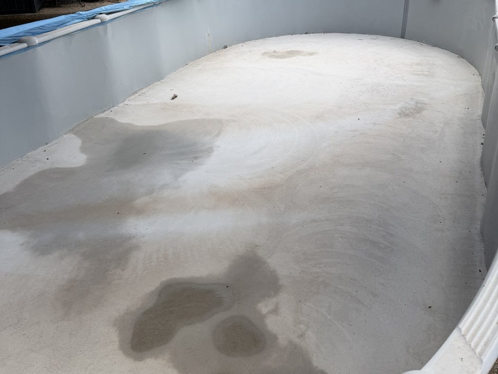 Vinyl liner pool with the liner removed and a new concrete floor poured